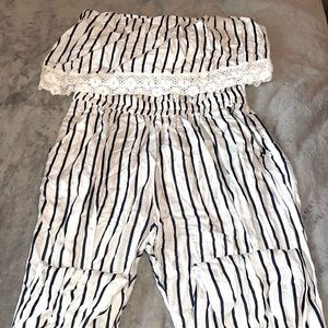 Used but in excellent condition.
Size: 2XL 

Sleeveless
Strapless
Tapered Leg